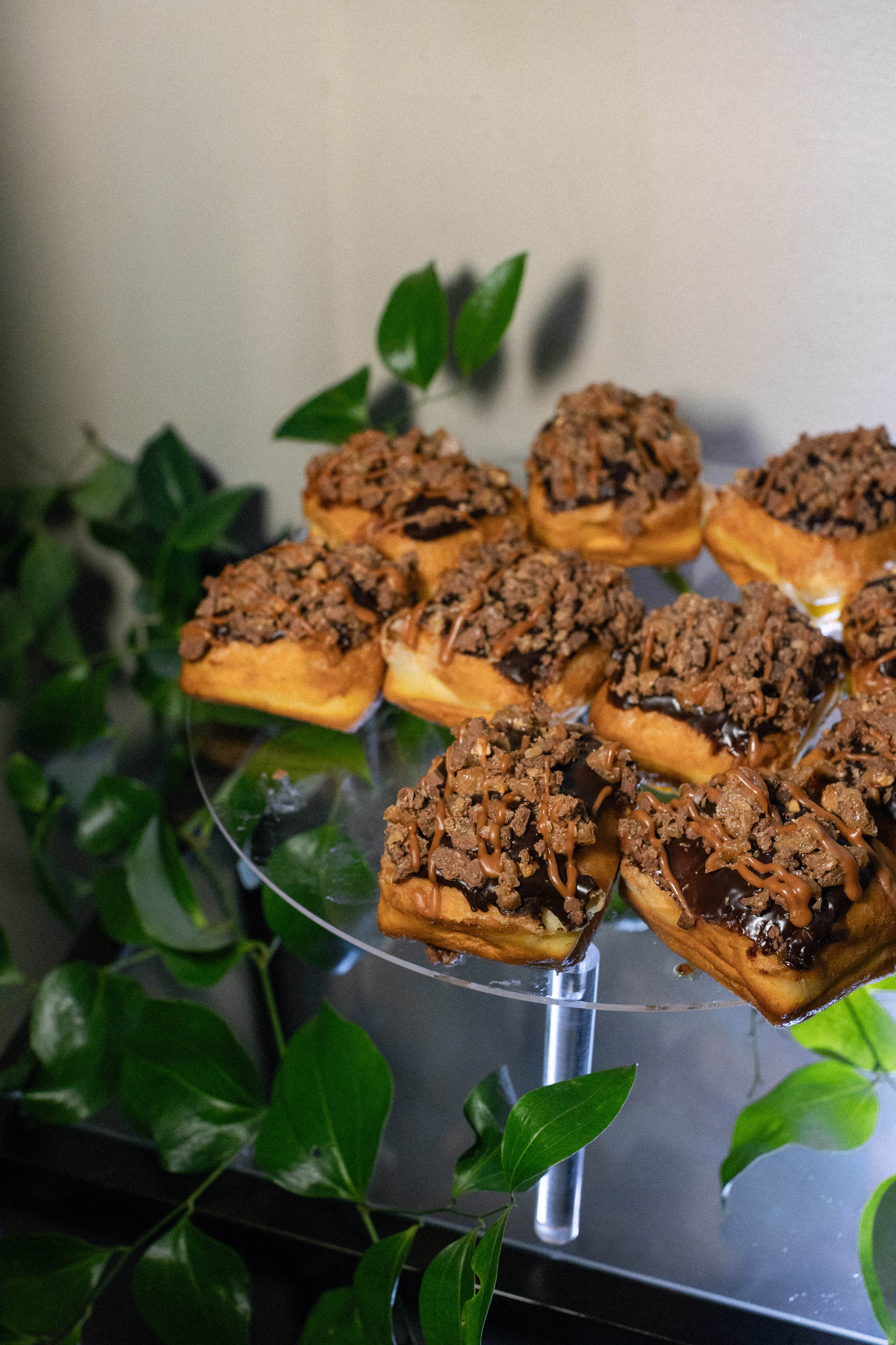 donut desserts with chocolate, caramel, and candy toppings