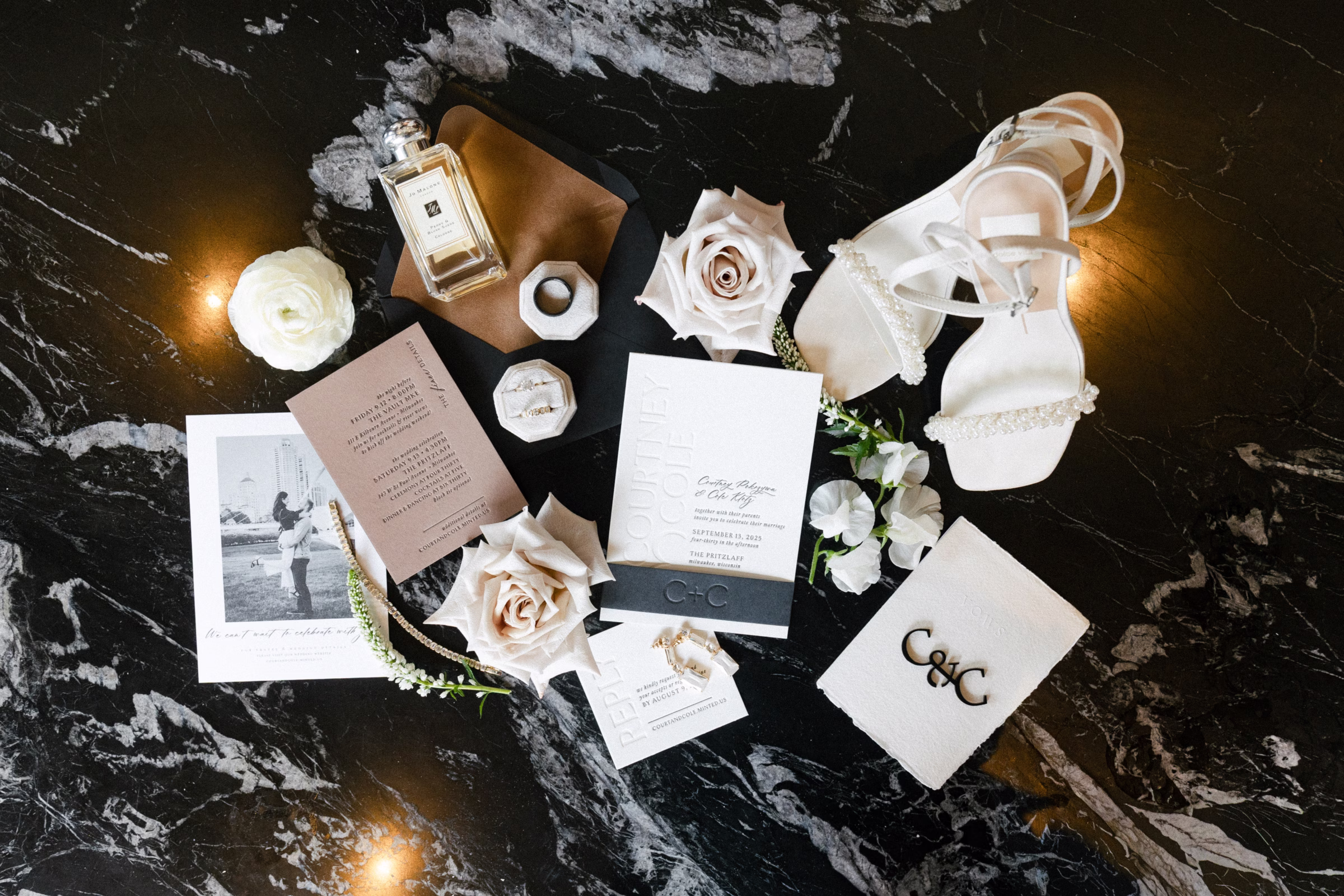 a luxurious stationery suite from Bay View Printing Co., with letterpress embossing, black and white photography, and modern type mixed with an elegant script