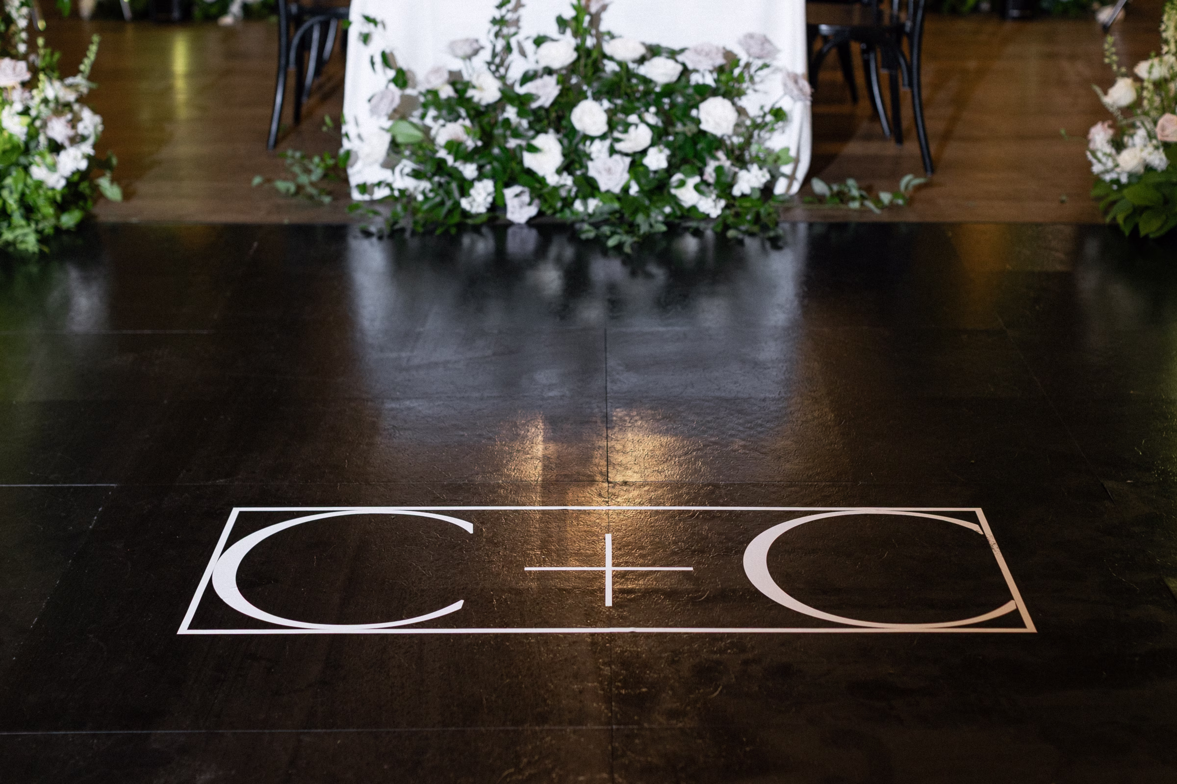 a custom couple monogram on the dance floor