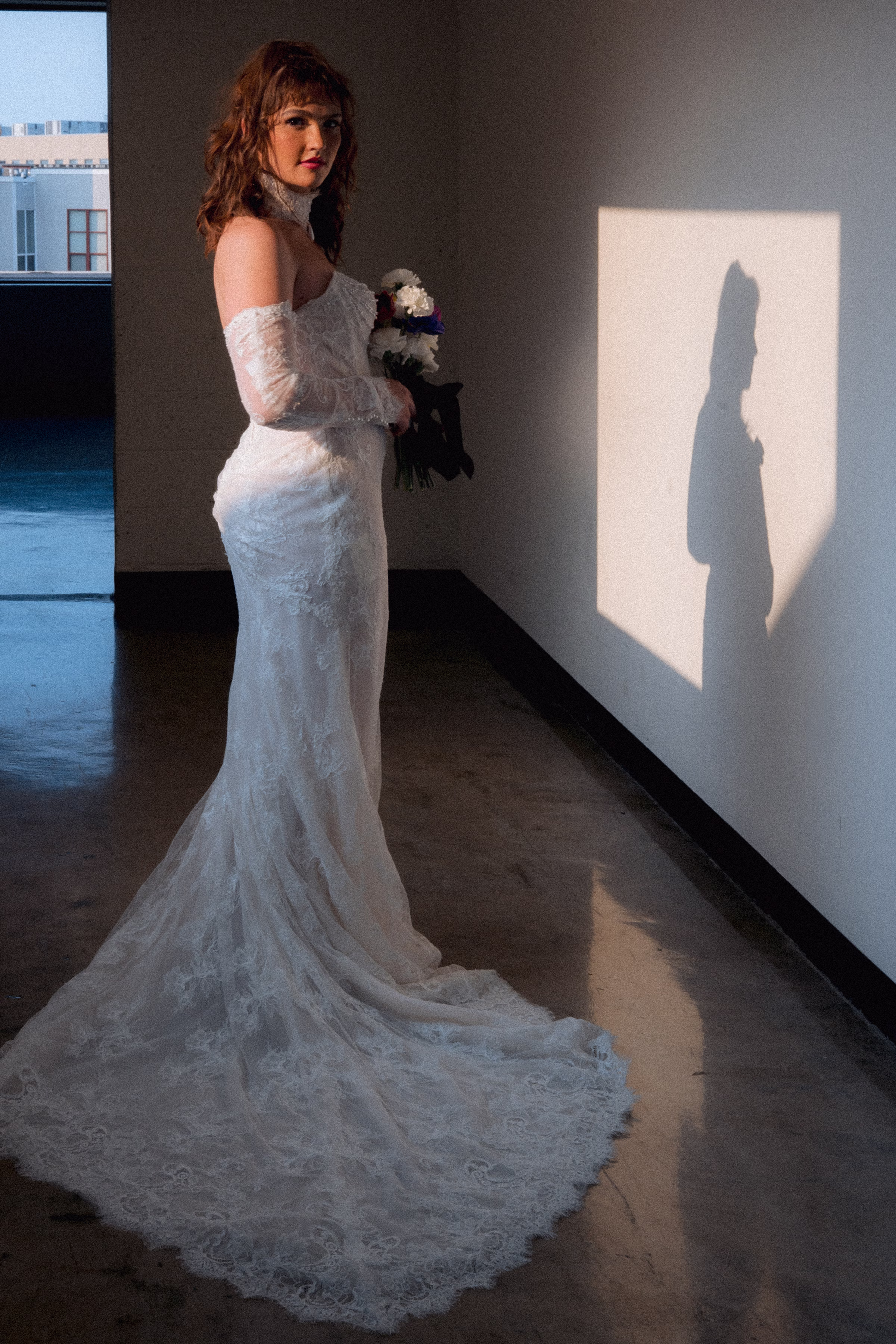 a bride wears a lace dress from Miss Ruby Bridal at Jan Serr Studio in Milwaukee