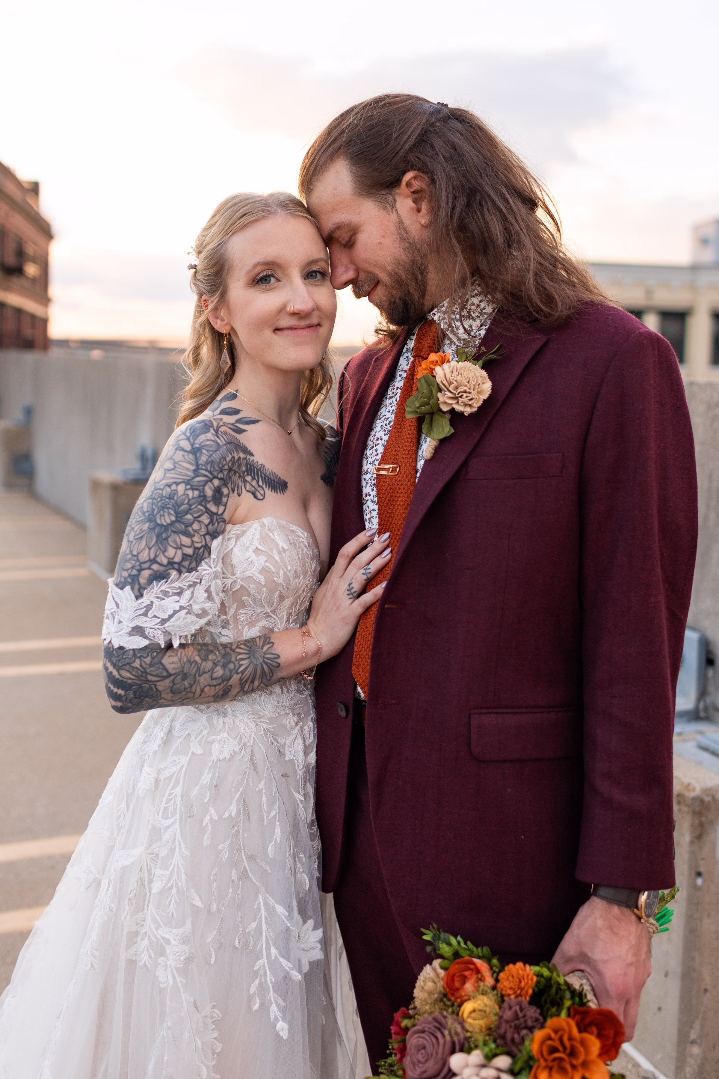 moody romantic fall wedding loft on broadway milwaukee couple portraits 611 11290 - A Moody, Romantic Fall Wedding at The Loft on Broadway | Sarah + Nathan a romantic sunset photo of a newlywed couple at their romantic fall wedding in Milwaukee