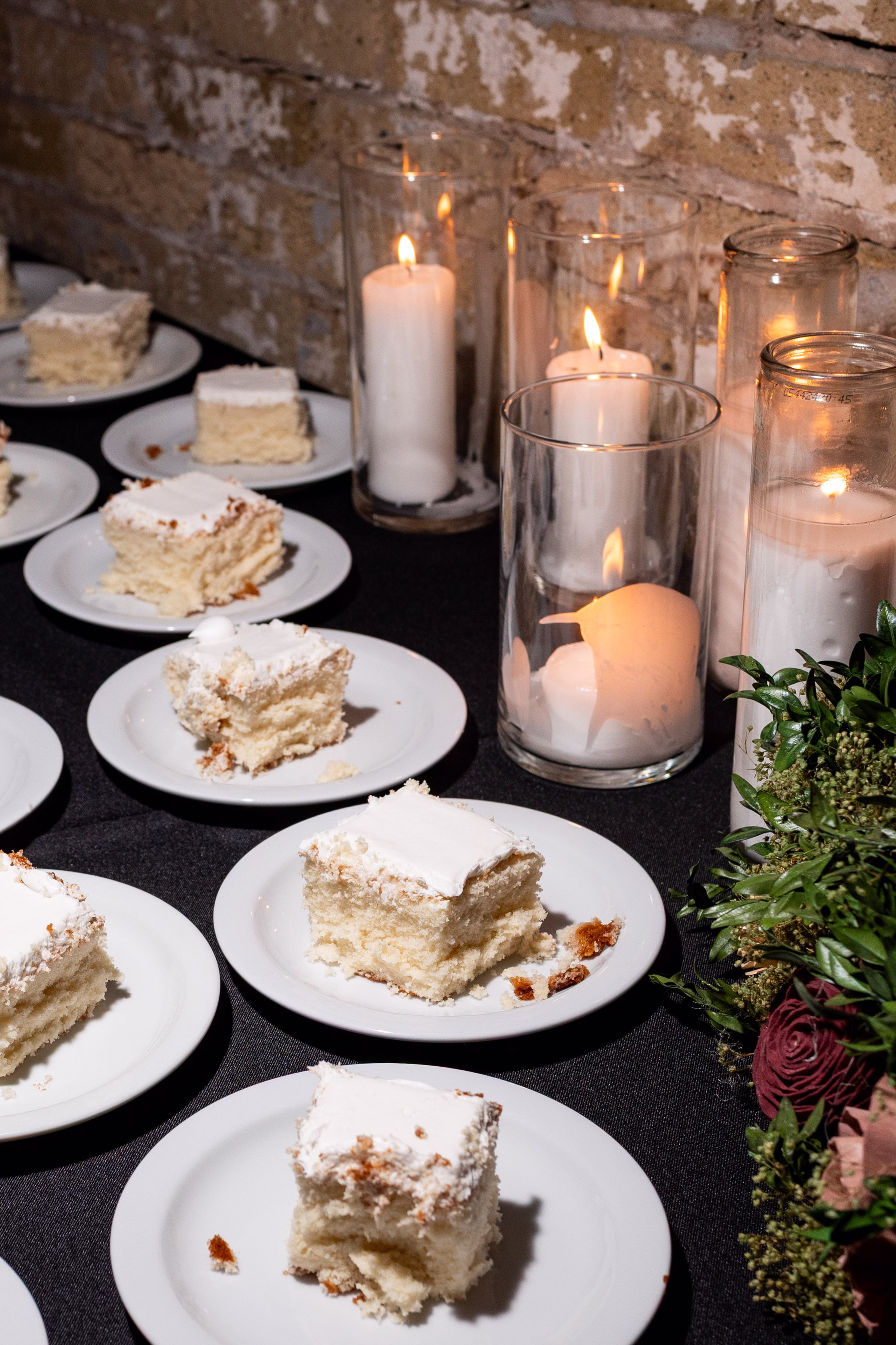 moody romantic fall wedding loft on broadway milwaukee reception cake 777 1291 - A Moody, Romantic Fall Wedding at The Loft on Broadway | Sarah + Nathan delicious cake slices by baker Whisk Chick are individually plated for guests