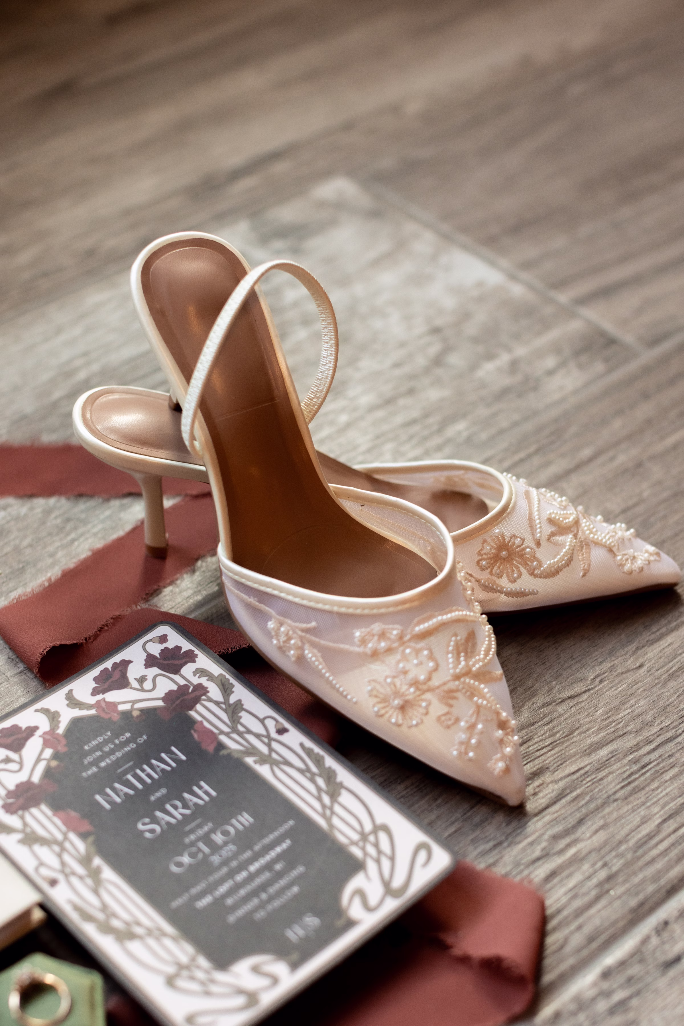 moody romantic fall wedding loft on broadway milwaukee wisconsin stationery accessories 24 10045 - A Moody, Romantic Fall Wedding at The Loft on Broadway | Sarah + Nathan a detail photo showing beaded bridal high-heel shoes